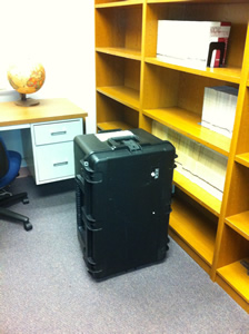 Mobile laptop lab with six computers, power cords, and mice